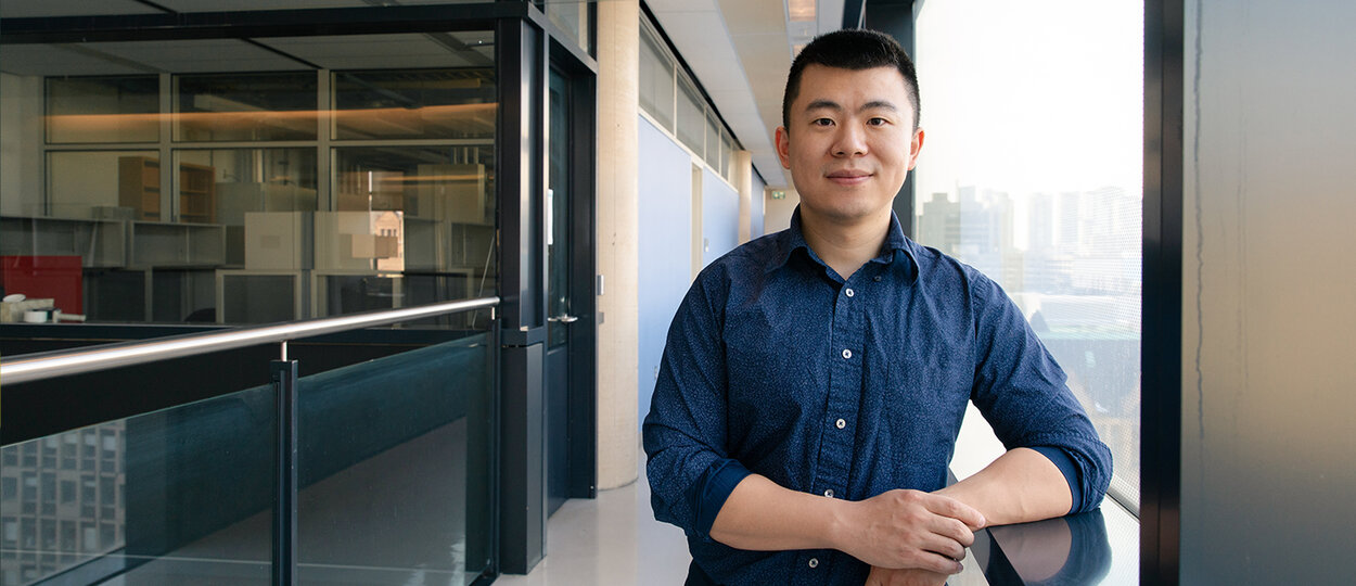 Professor Bowen Li in front of his lab