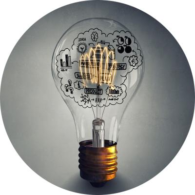 Graphic of lightbulb with brainstorm writing inside