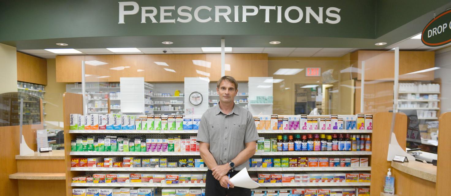 Pharmacist Mike Colebrook standing in his pharmacy in Coldwater, Ontario