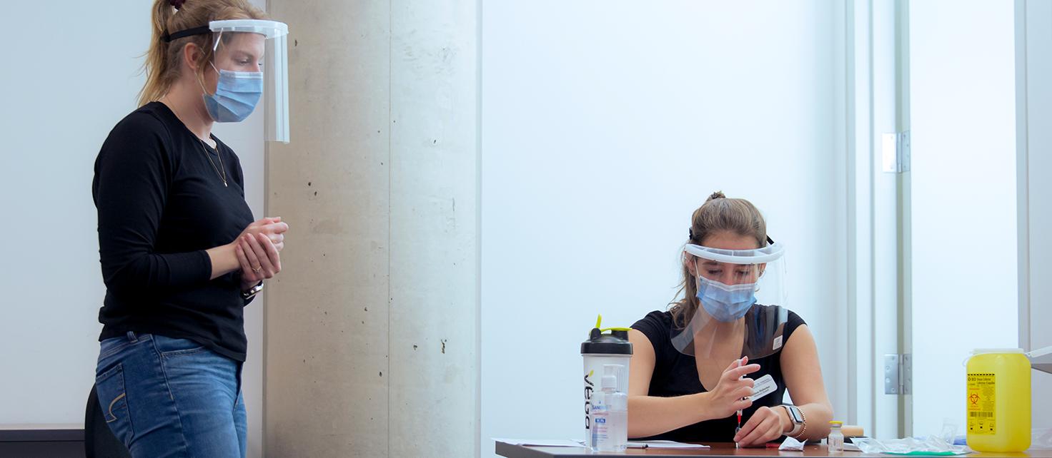 Student and Instructor during Injection Training