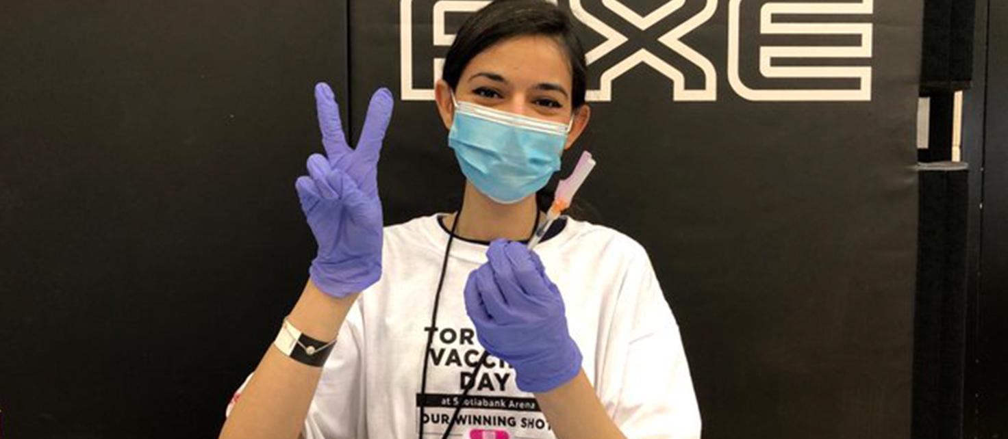 PharmD student Pooja Patel at preparing vaccine dose