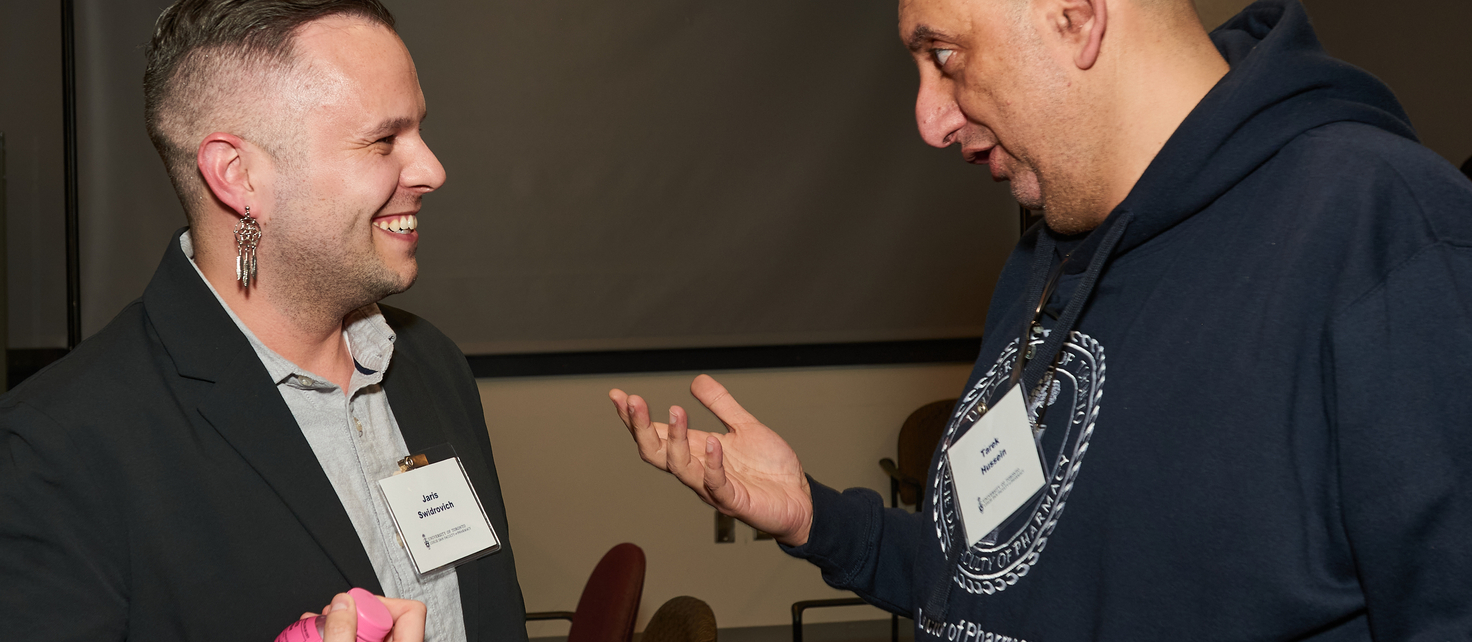 Panelist in discussion with event registrant