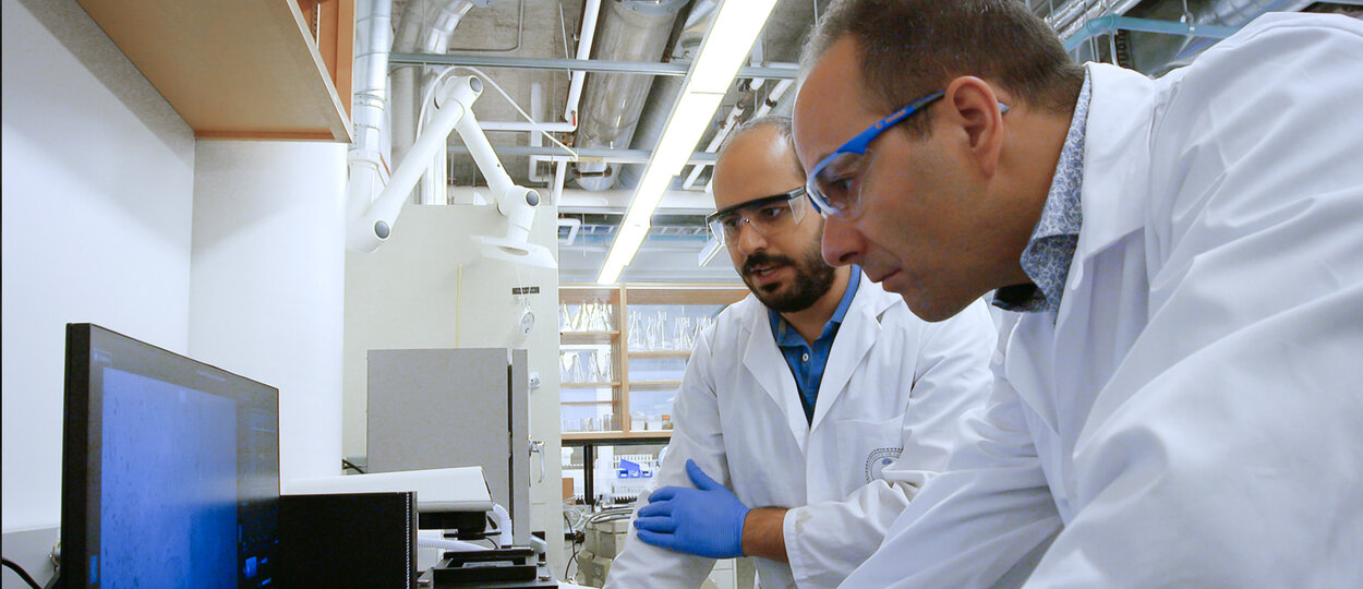 Professor Stephane Angers & Post doc fellow Rony Chidiac working in lab