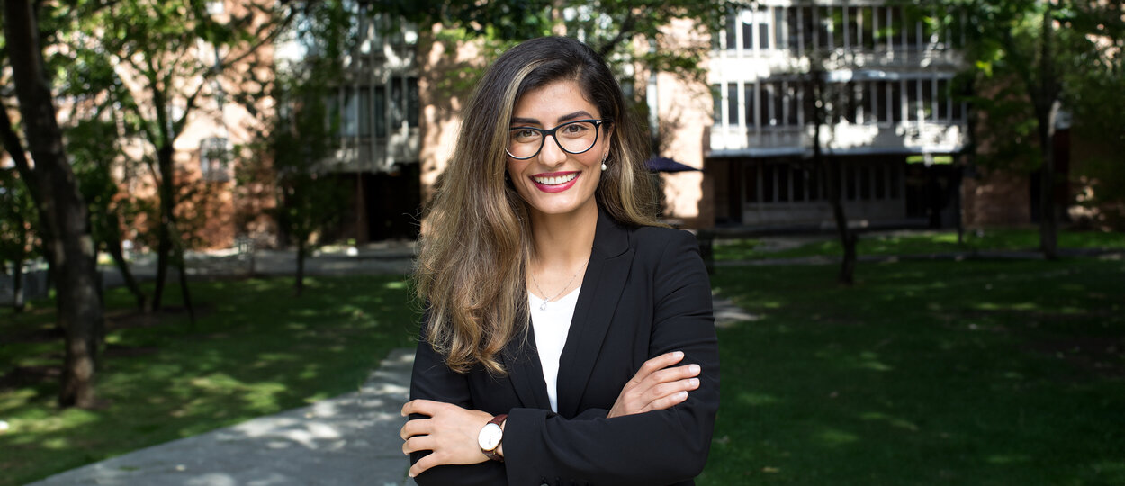 Portrait of PharmD student Setayesh Yazdani outside of Massey College at the University of Toronto