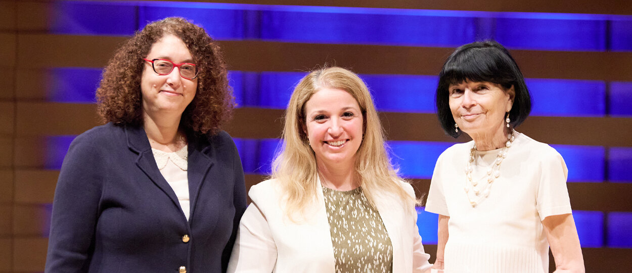 Dean Lisa Dolovich presenting the Professor of the Year Awards to Andrea Swanson and Debra Sibbald