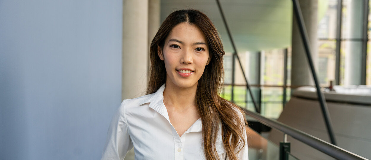 PhD graduate Misaki Kondo with LDFP pods in background