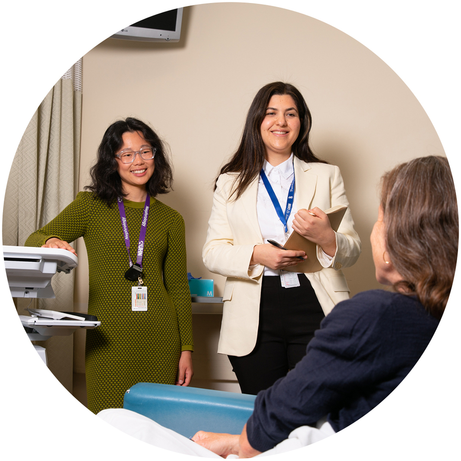 Two clinicians counselling a patient 
