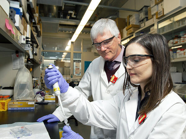 Ray Reilly and Valerie Facca in lab
