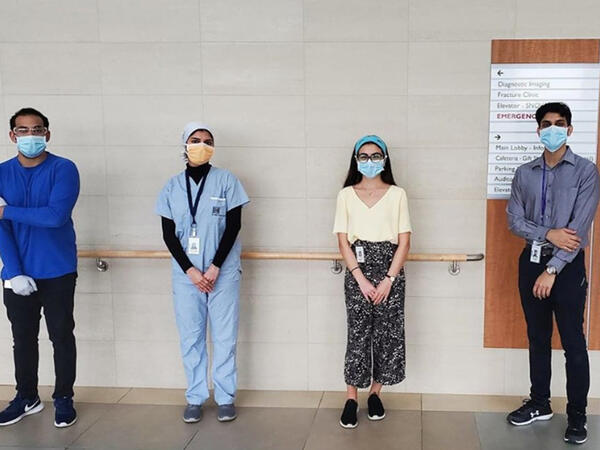 4 pharmacists standing 6 feet apart 4 pharmacists standing 6 feet apart