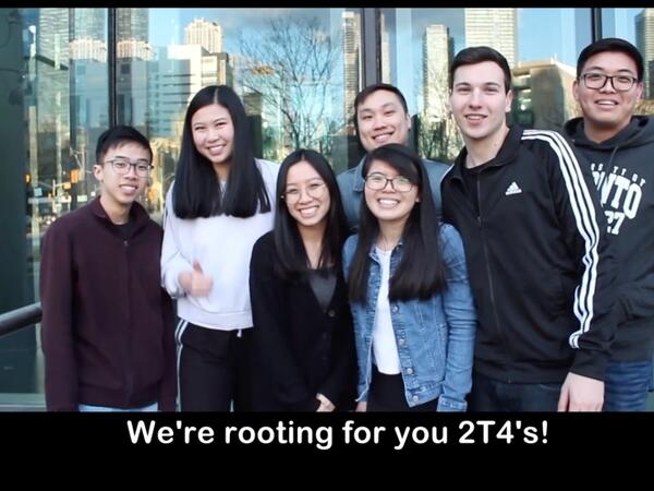 group of students gathered outside the Pharmacy building on U of T campus