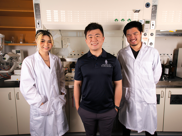Assistant Professor Bowen Li with students in lab Assistant Professor Bowen Li with students in lab