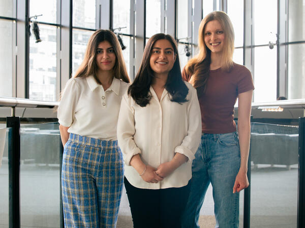 PharmD students Nursan Abdullah, Harneet Gill and Nina Seuntjens photographed inside the Leslie Dan Faculty of Pharmacy Building