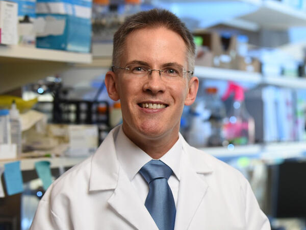 Professor Tim Corson photographed in lab