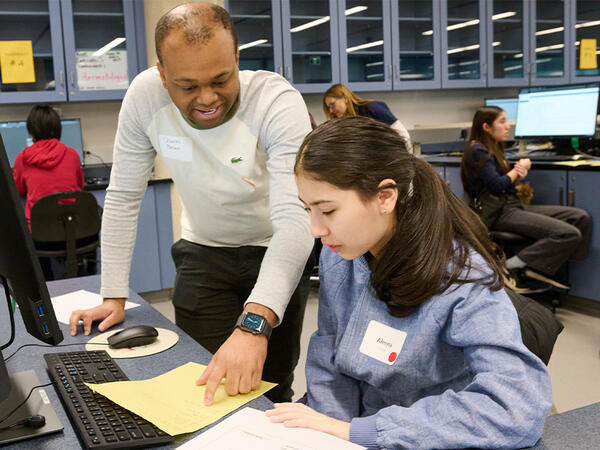 Instructor leading student during PharmPath event