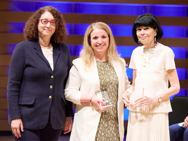 Dean Lisa Dolovich presenting the Professor of the Year Awards to Andrea Swanson and Debra Sibbald Dean Lisa Dolovich presenting the Professor of the Year Awards to Andrea Swanson and Debra Sibbald