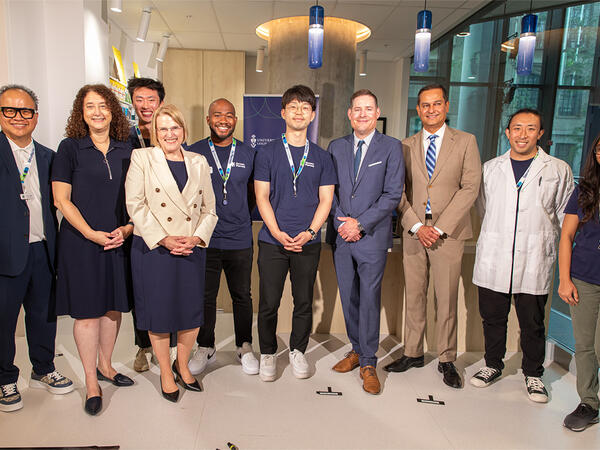 Honourable Sylvia Jones with Dean Dolovich, students and pharmacists in Discovery Pharmacy