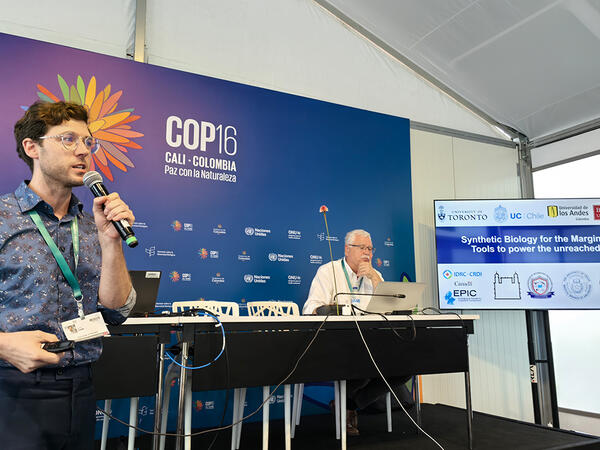 Justin Vigar presenting at COP16 conference in Cali, Colombia