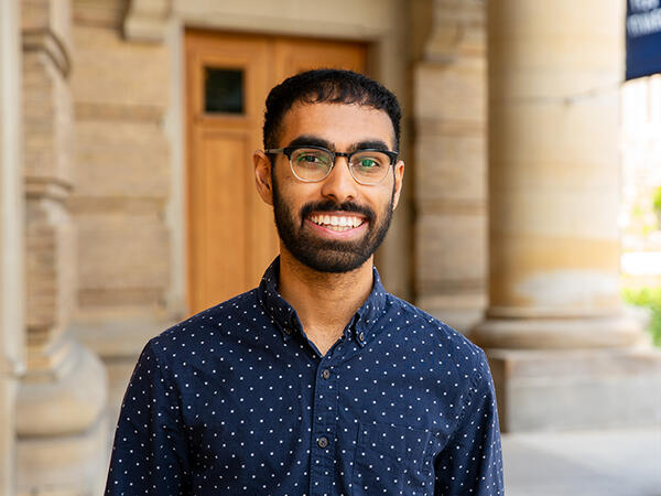 2T5 PharmD Valedictorian Ashish Gante pictured with convocation hall in background 2T5 PharmD Valedictorian Ashish Gante pictured with convocation hall in background