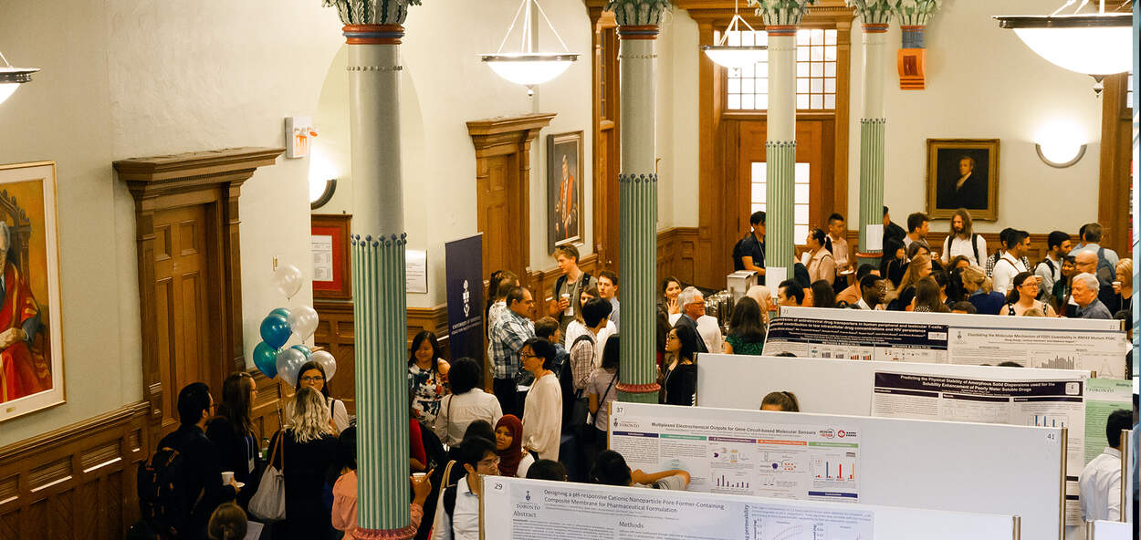 Graduate Research in Progress Symposium Overhead photo of attendees at Graduate Research in Progress Symposium