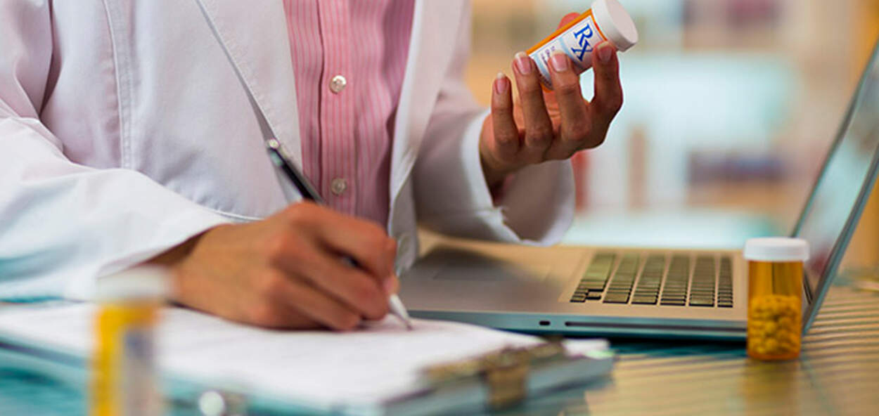 Clinical Pharmacy Research Pharmacist Reviewing Medication