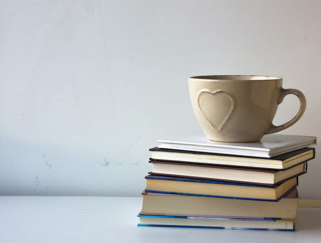 Book club image Books with a coffee mug