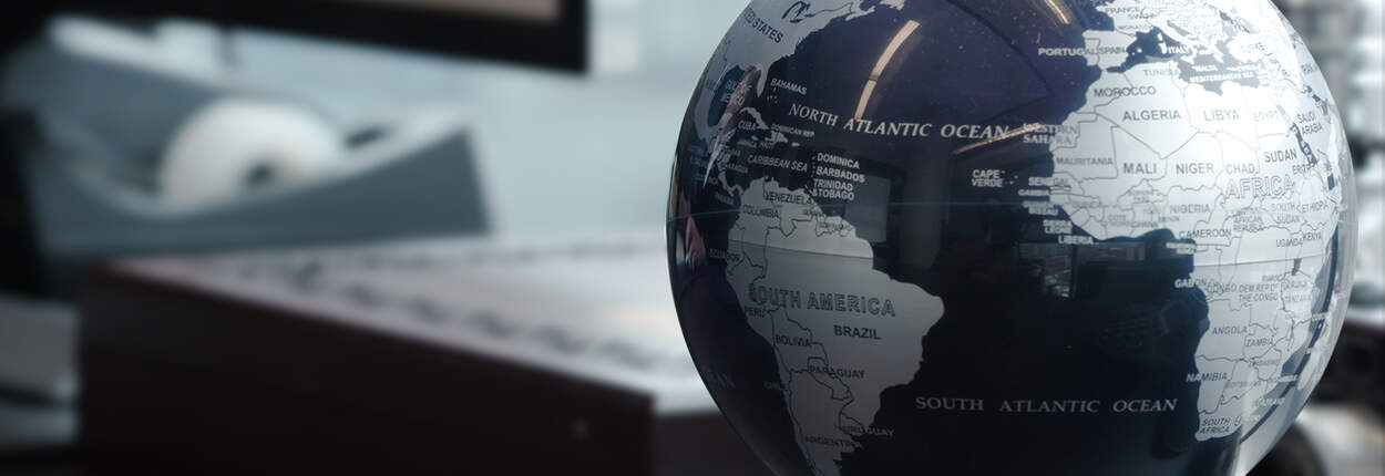 Photo of Globe sitting on a desk Photo of Globe sitting on a desk