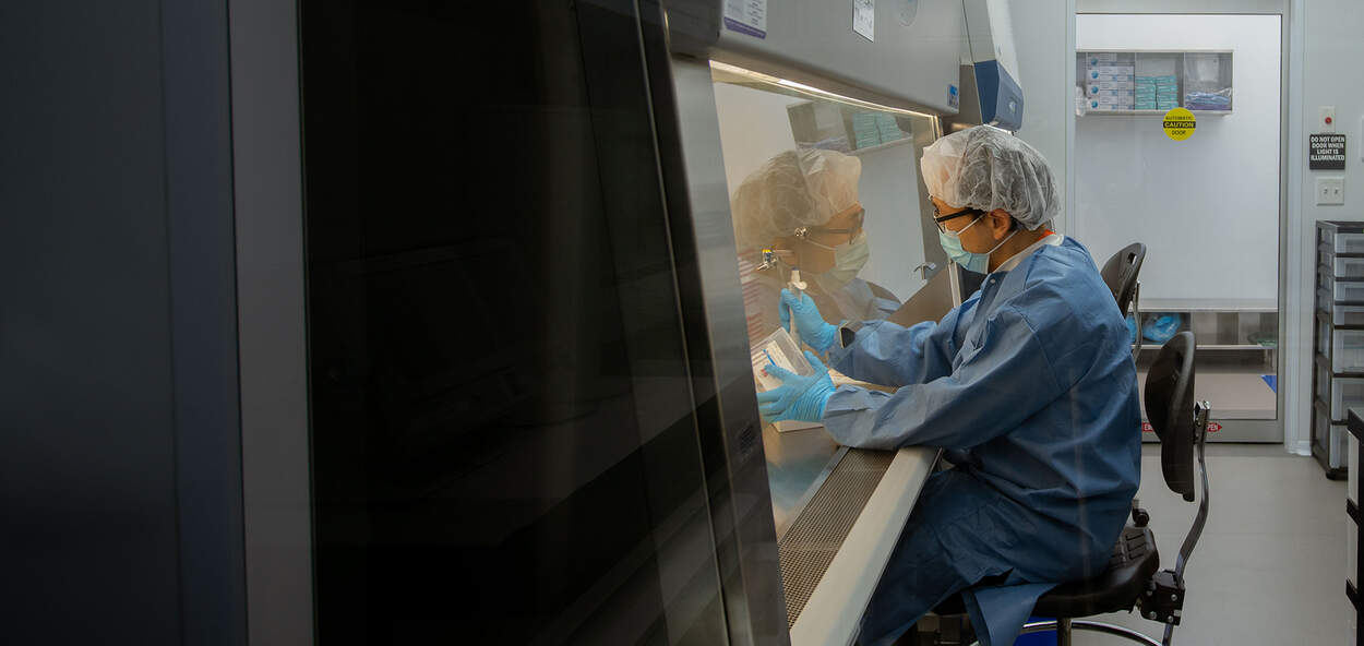 Researcher Conrad Chan working in the CPO Clean Room