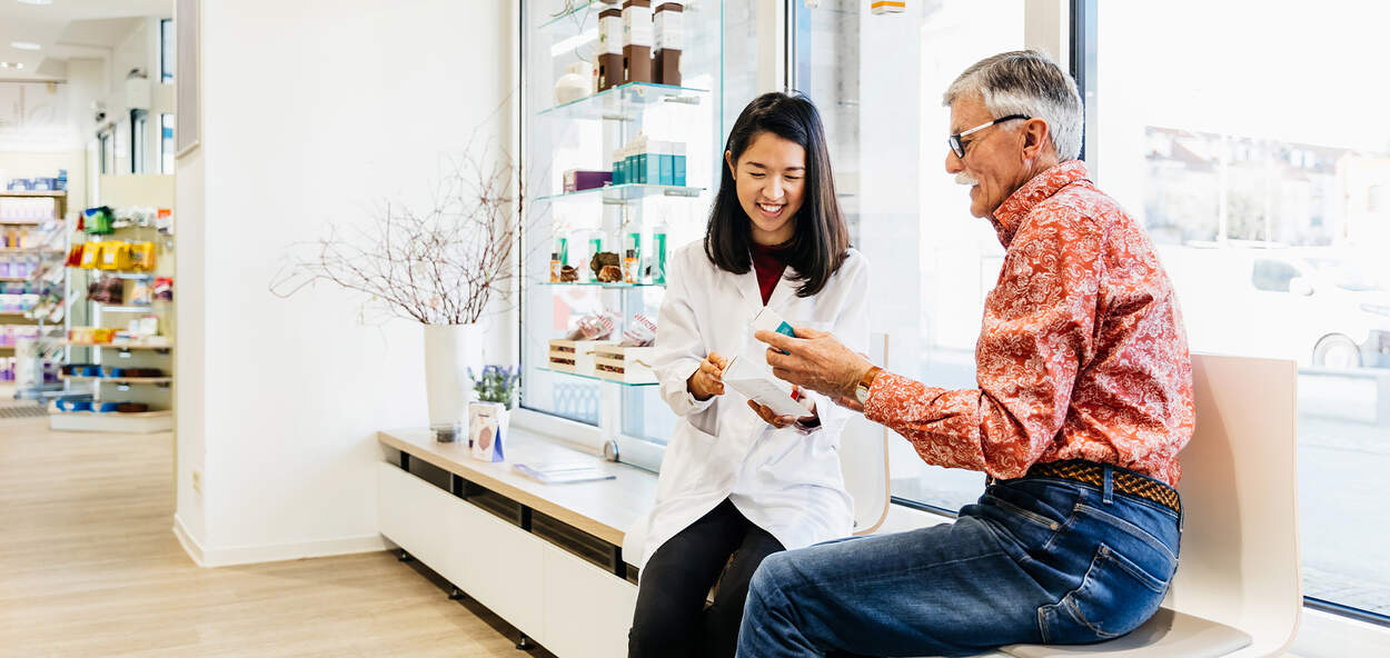 Pharmacist speaking to patient Pharmacist speaking to patient
