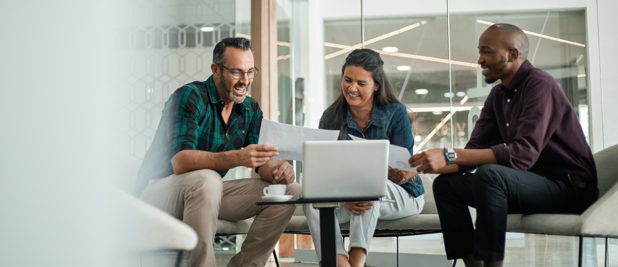 three professionals meeting in modern office