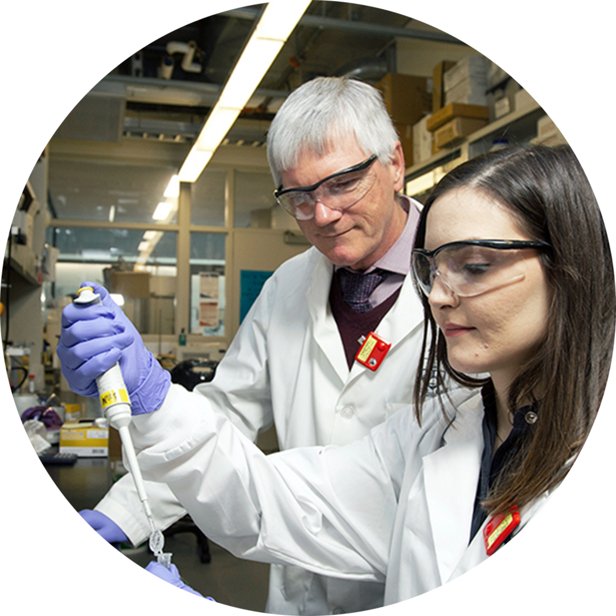 Dr. Raymond Reilly and Valerie Facca working in lab