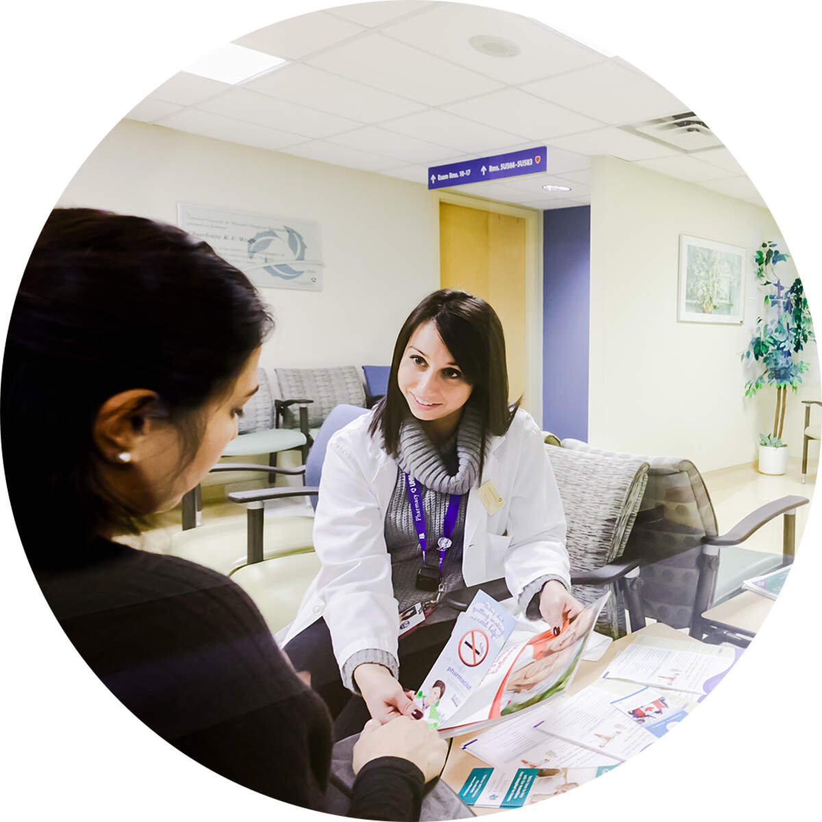 Pharmacist in discussion with patient