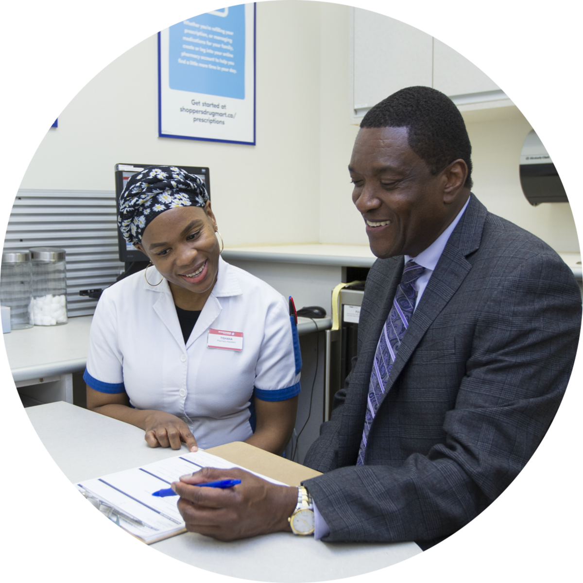 Pharmacist Ian Stewart with Pharmacy Technician Tishana Nelson-Erwin