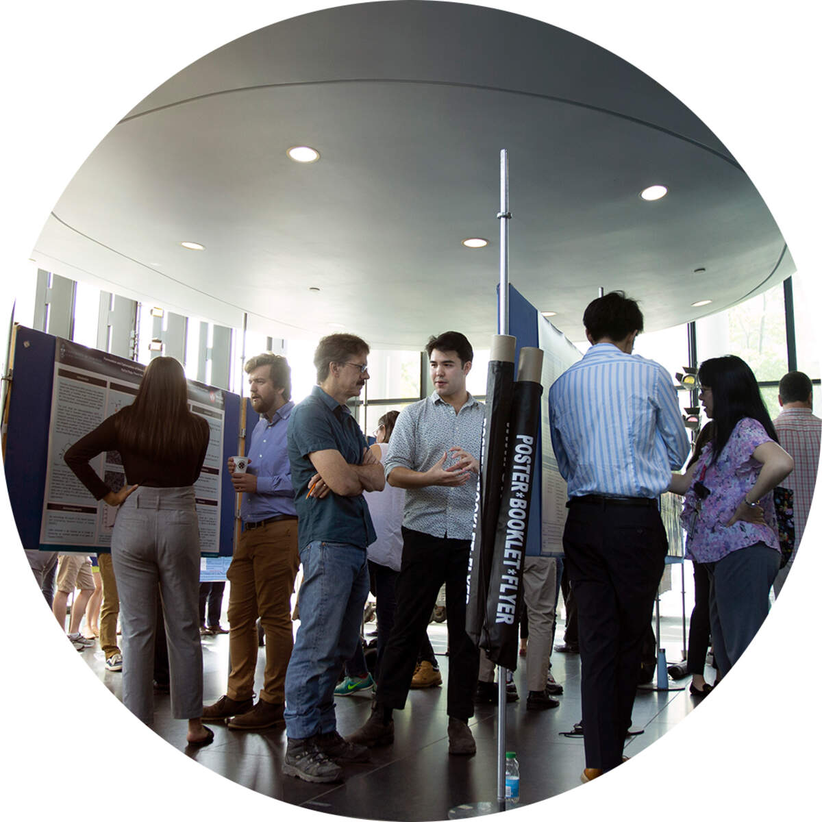 Photo of students and researchers at a poster session at the Leslie Dan Faculty of Pharmacy